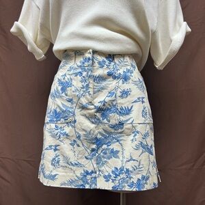 Floral tapestry mini skirt with pockets